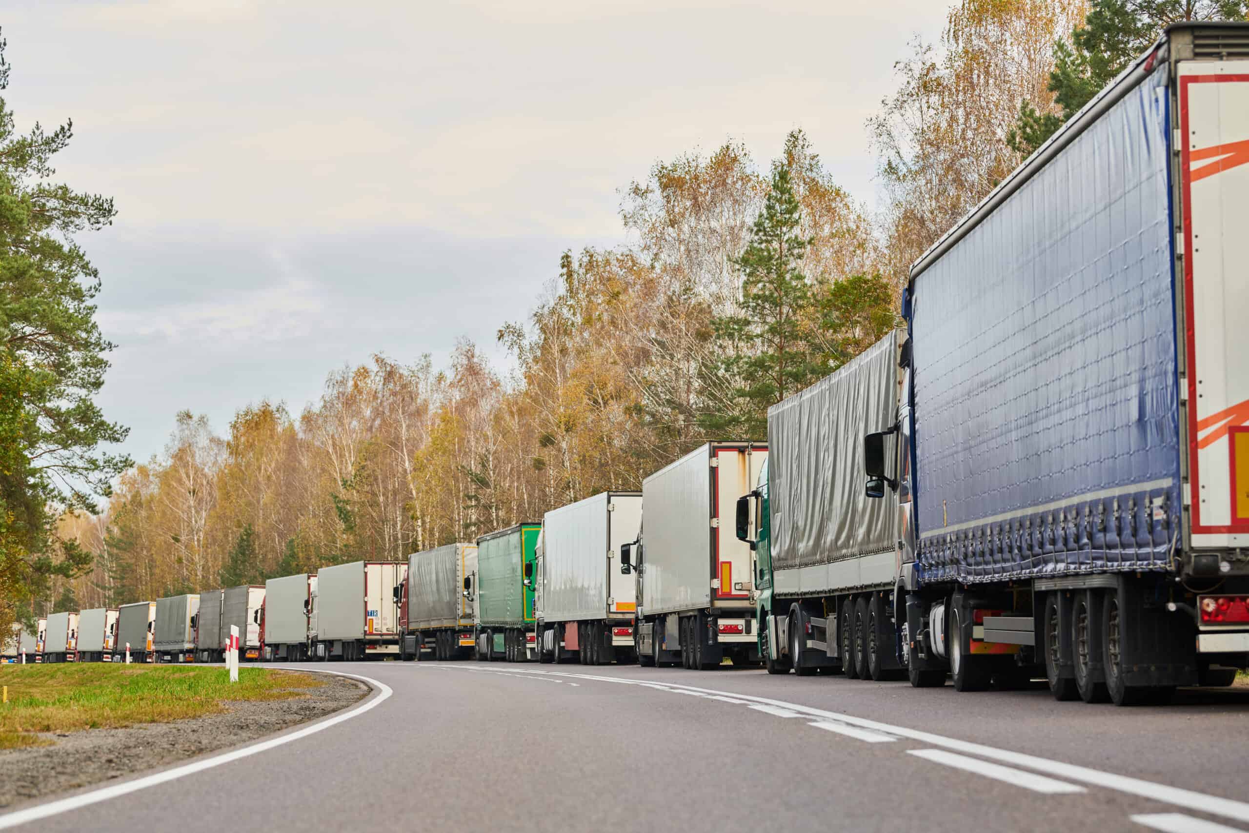 dry vans stuck in a traffic jam due to logistics and border challenges